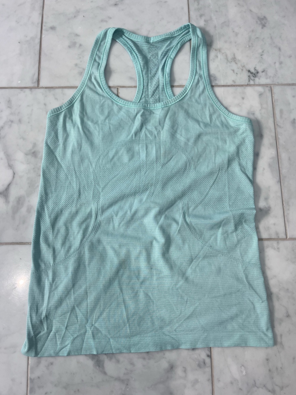 lululemon athletica Light Aqua Racerback Tank Top- little stain in front